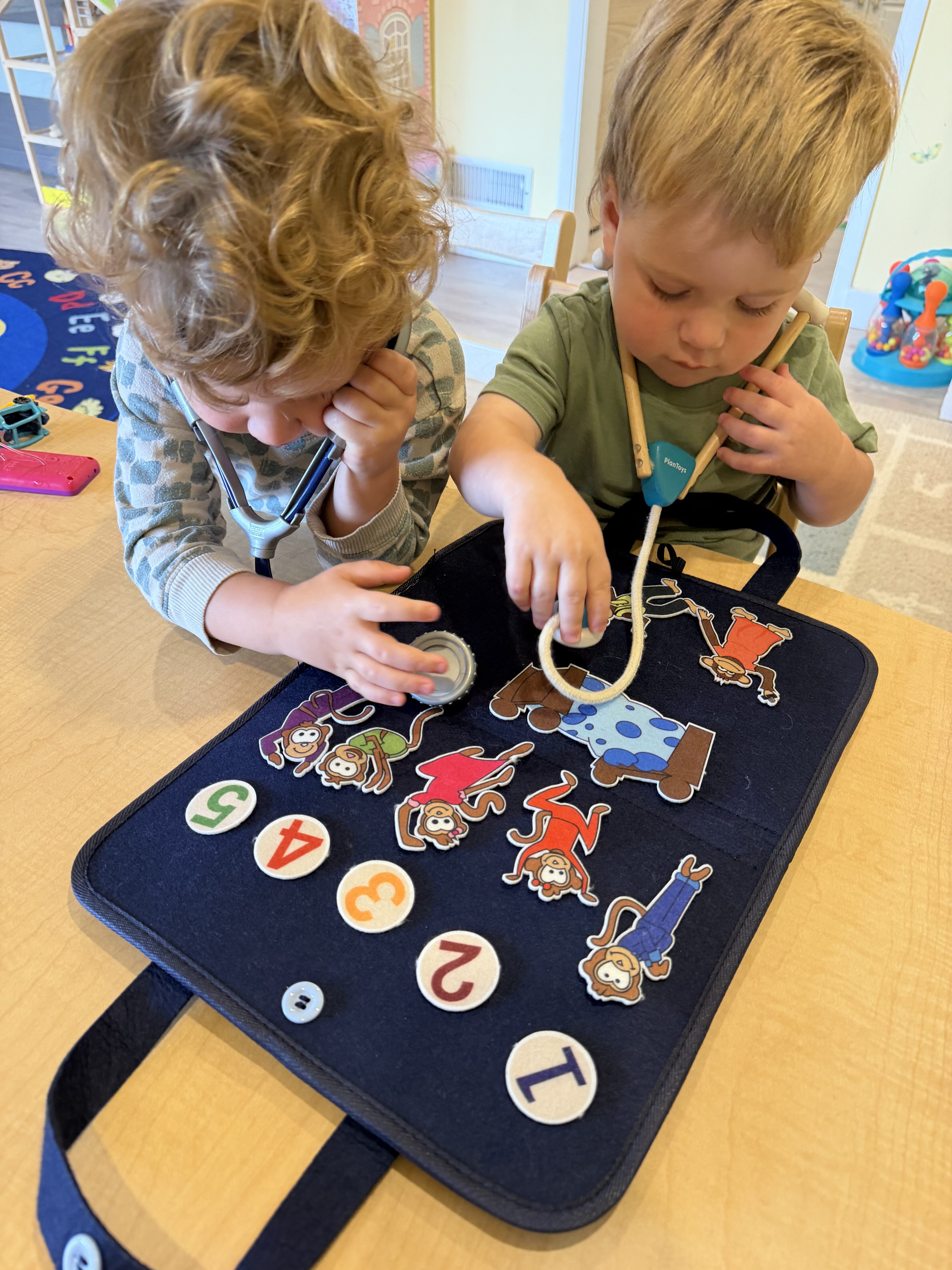 Children playing together at Kinderly childcare